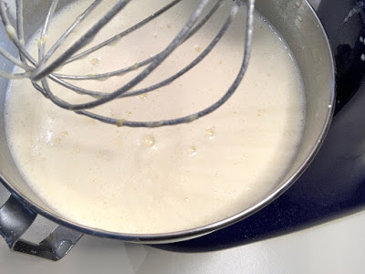 Queijadas batter being made in a stand mixer