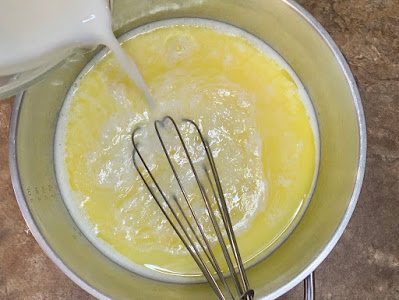 Queijadas batter being made in a stand mixer