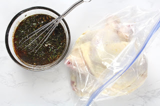 Bowl of marinade and bag of raw chicken legs