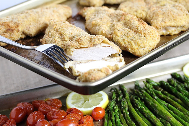 SHEET PAN PARMESAN CHICKEN WITH ASPARAGUS AND TOMATOES