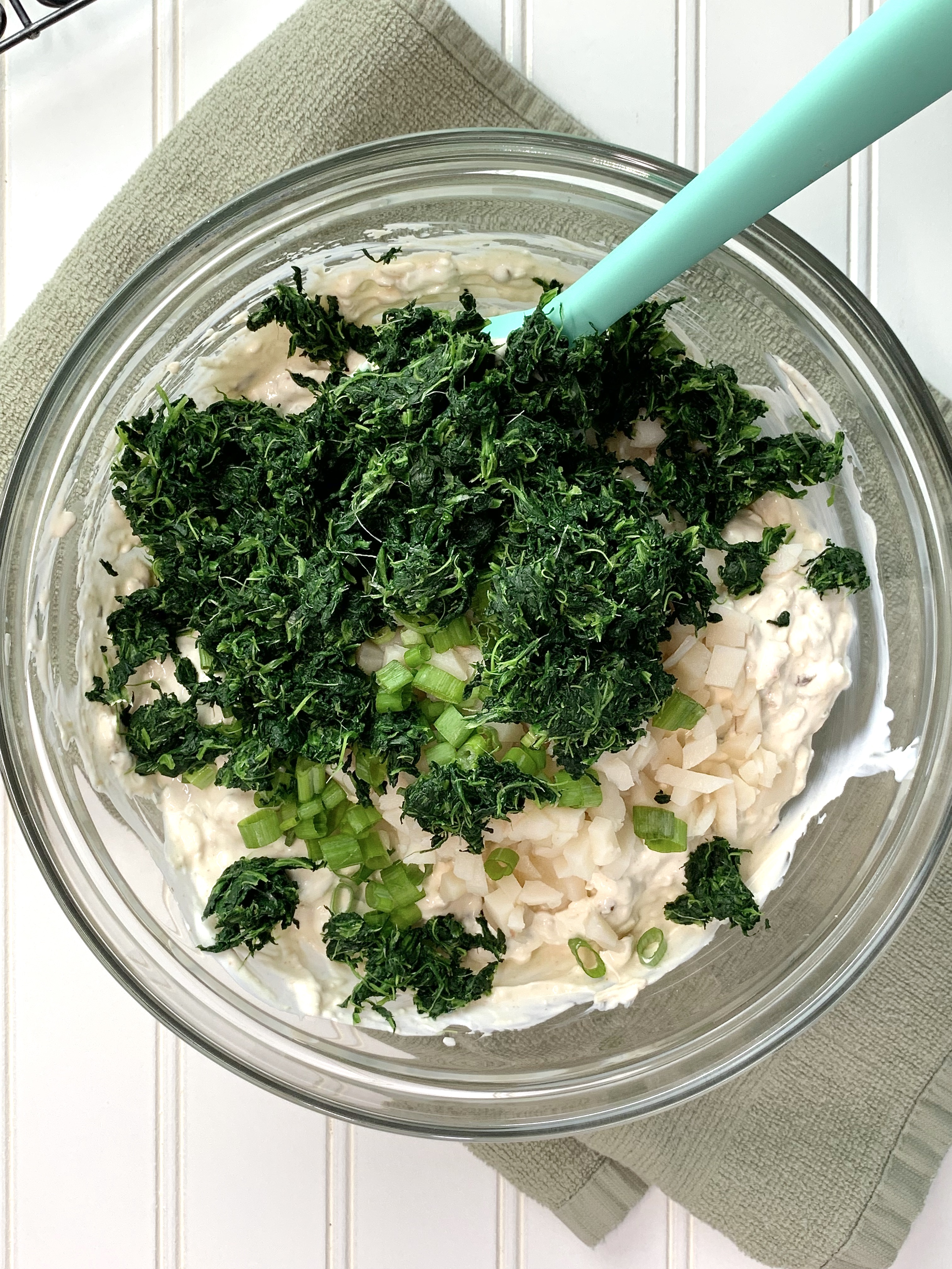 Spinach dip mixing in bowl