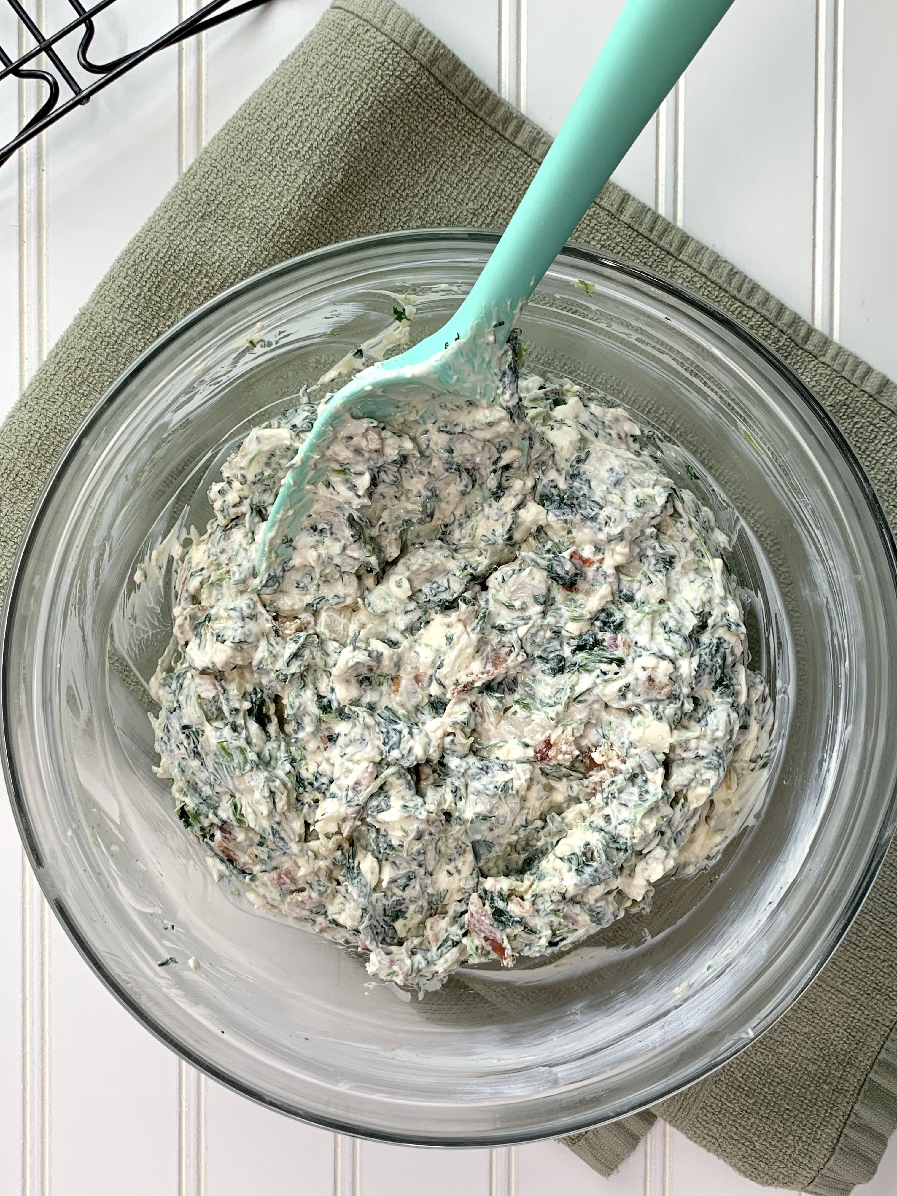 Spinach and Bacon Dip in glass bowl