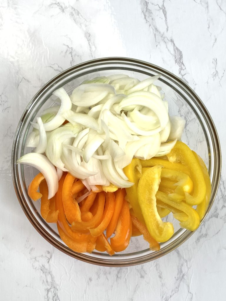 Sliced onion and bell peppers