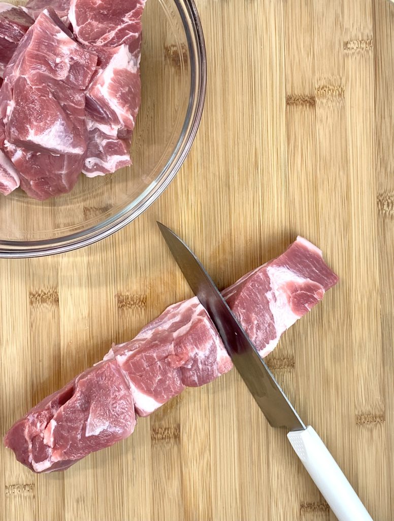 boneless pork ribs on cutting board